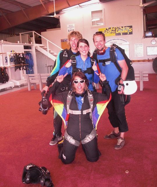 Michelle at Skydive Dallas posing in her camera suit before a jump.